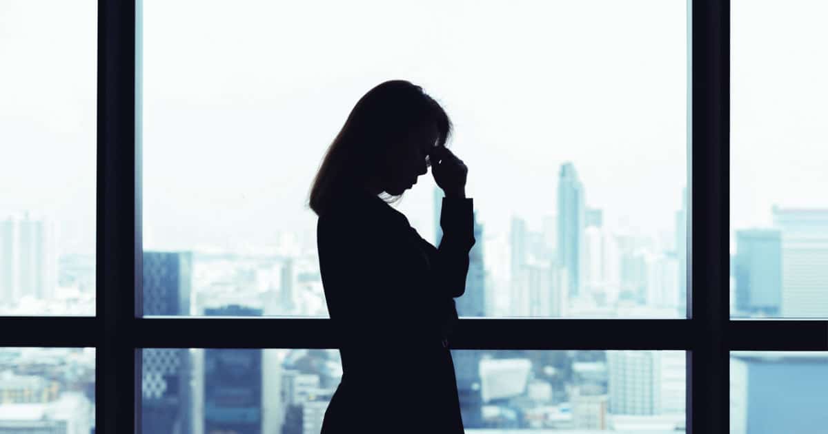 business woman fatigued from conflict with a co-worker